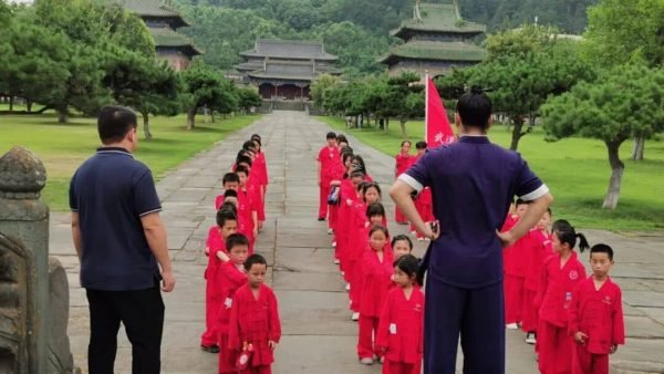 iamge shows students lining up inside the academy