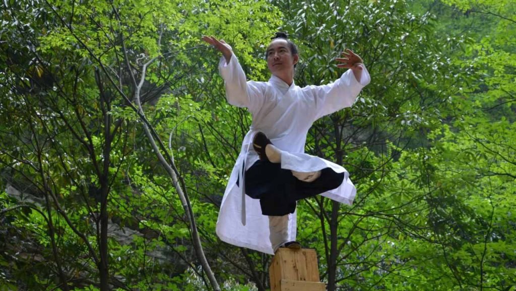 image shows master qingfengzi doing qigong